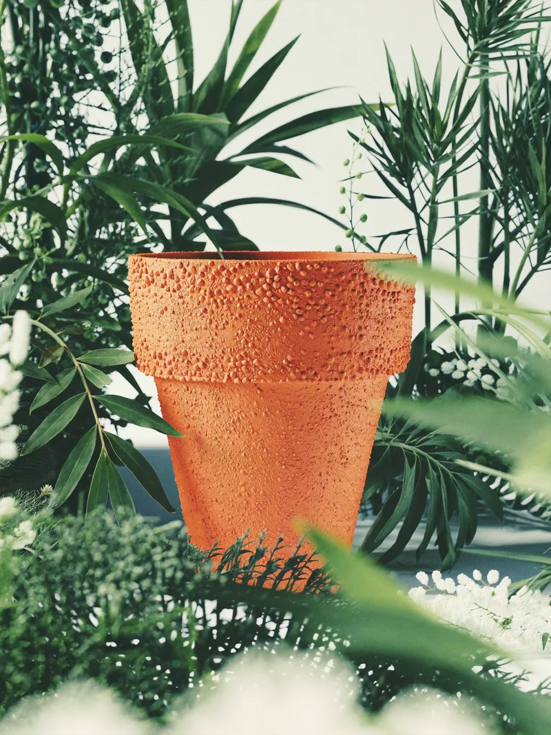 Illustrazione concettuale di un vaso in terracotta dalla superficie materica.